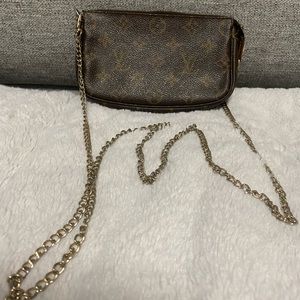 Louis Vuitton monogram pochette pouch with unbranded chain